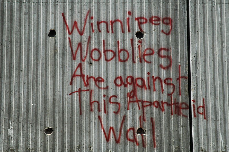 "Muro del apartheid": graffiti wobblie en la Palestina actual.